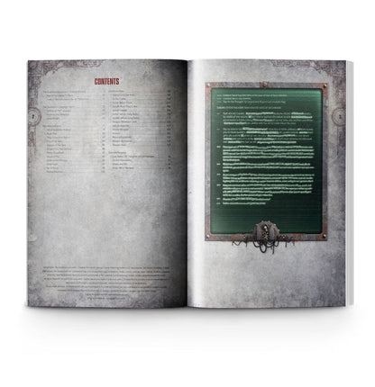 Open book with a metallic cover and text on a white background